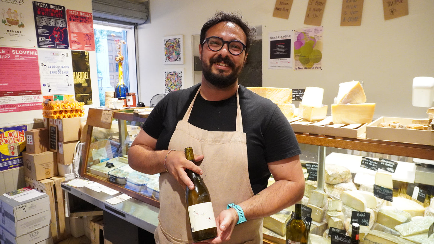 Artisan cheese and wine tasting in Nice Old Town with local sommelier presenting French cheeses inside a traditional fromagerie.