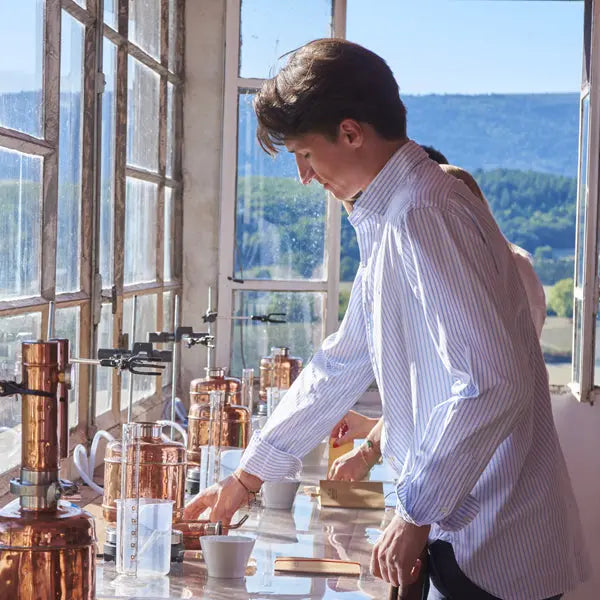 Gin distillery workshop in Provence near the French Riviera with copper stills and artisan spirit production during a guided tasting experience.