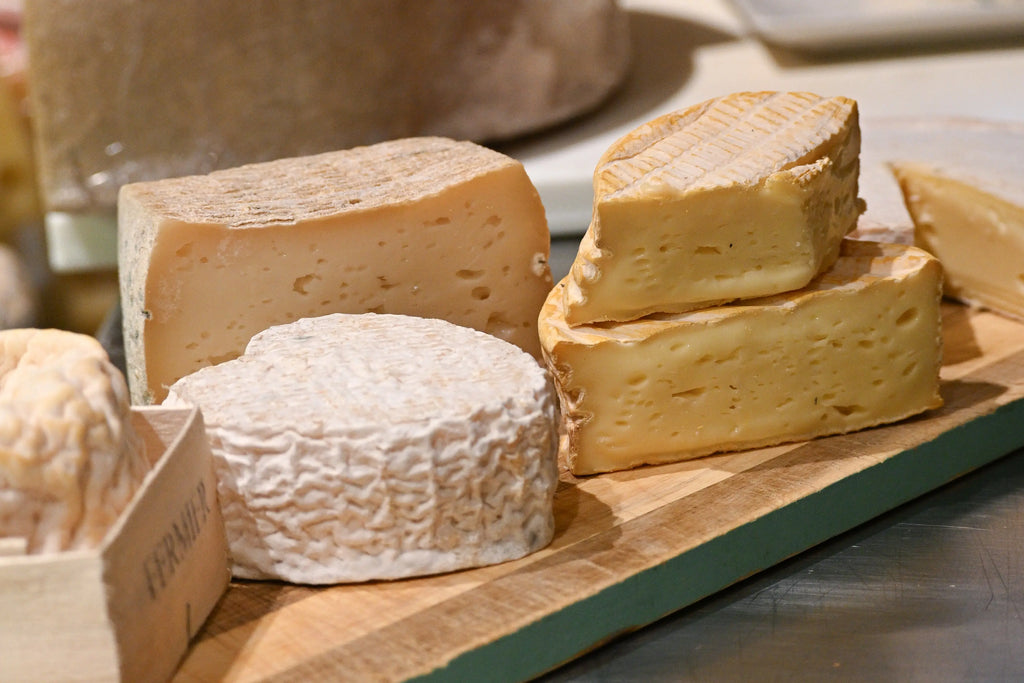 Artisan French cheese selection Nice France cheese tasting board local gastronomy Provence Alpes Côte d’Azur traditional French food culinary experience Nice food tour