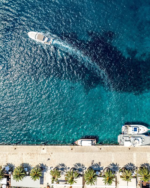 Aerial view of a boat excursion in turquoise waters along the French Riviera near Nice