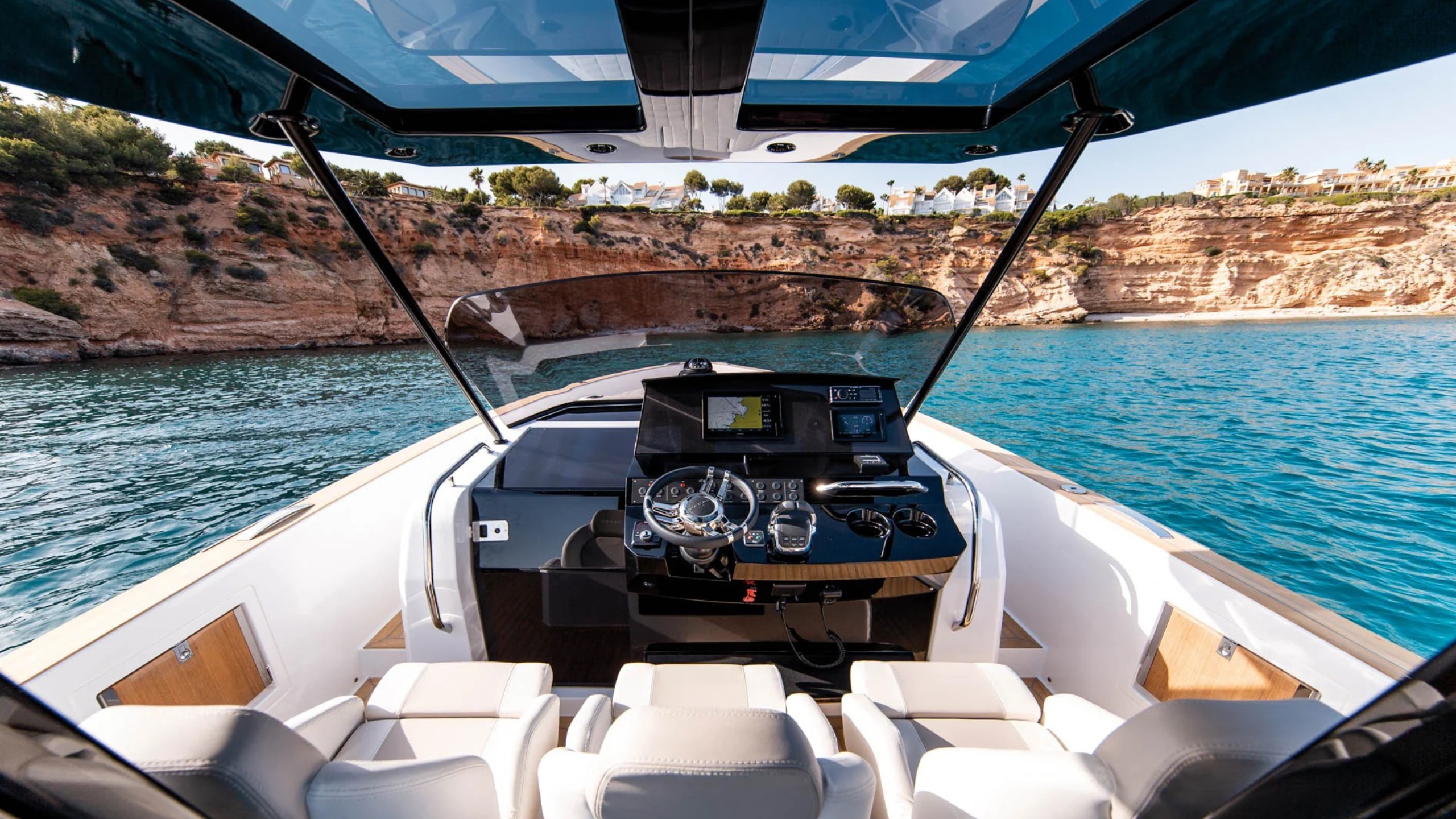 Boat tour along the French Riviera coast near Nice France Mediterranean cliffs and turquoise water luxury boat excursion Côte d’Azur travel experience Nice sea adventure