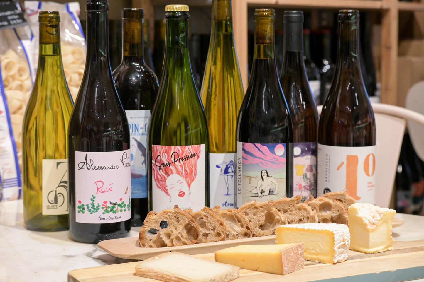 Wine and cheese tasting in Nice Old Town with French wines, artisan cheeses and fresh bread on a tasting table in the French Riviera.