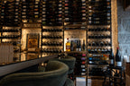 Traditional wine cellar with French wine bottles used for wine tasting experiences in Nice on the French Riviera